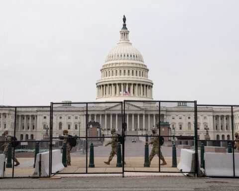 Security fencing surrounds the U.S. Capitol days after supporters of U.S. President Donald Trump stormed the Capitol in Washington