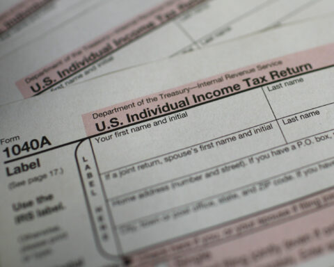 U.S. 1040A Individual Income Tax forms are seen at a U.S. Post office in New York