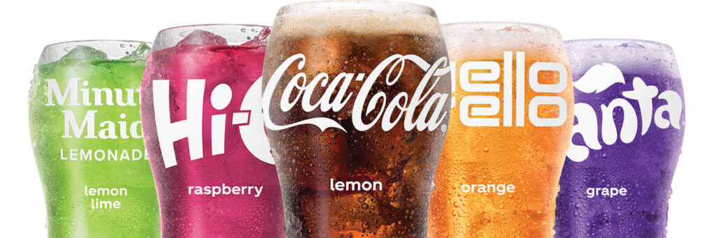 Lineup of Coca-Cola Freestyle beverages in bell glasses