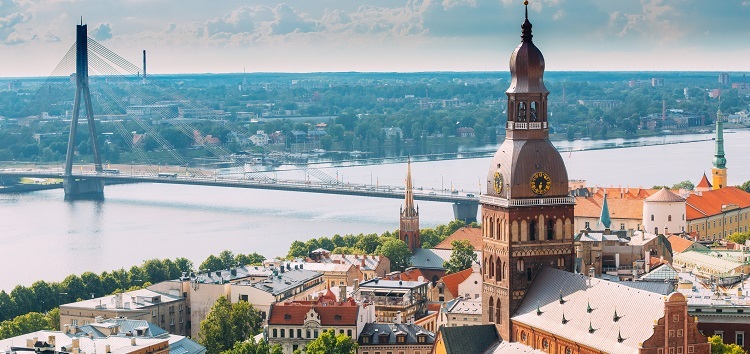 Riga, Latvia. Cityscape In Sunny Summer Day. Famous Landmark - Riga Dome Cathedral