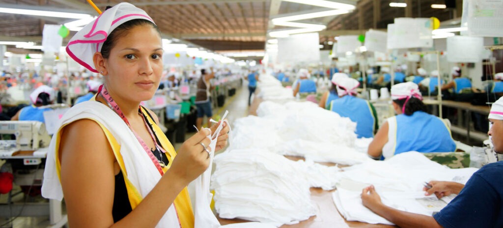 A garment worker inspects clothing in a factory in Nicaragua