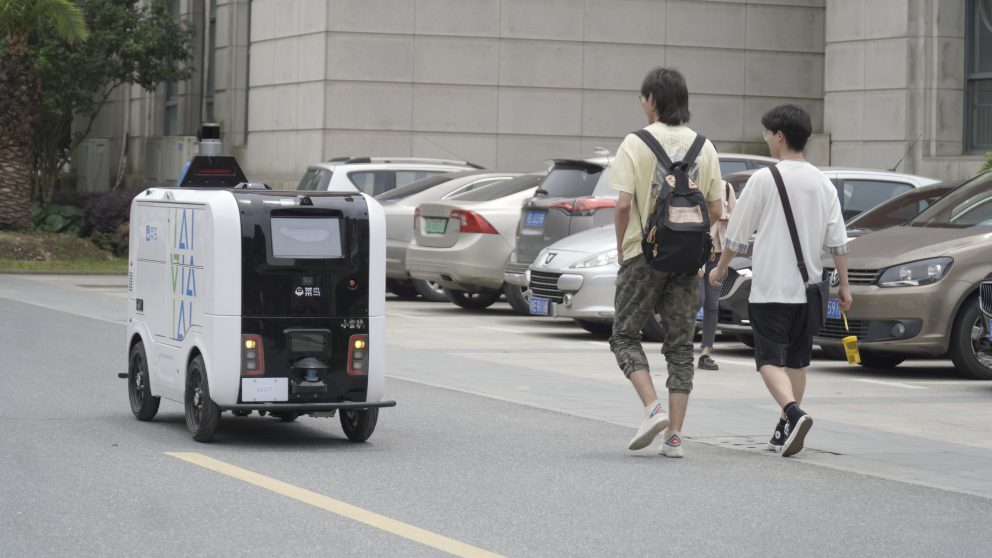 Robot in action delivering packages on a university campus in Wuhan, China