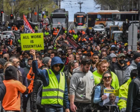 Construction workers and demonstrators