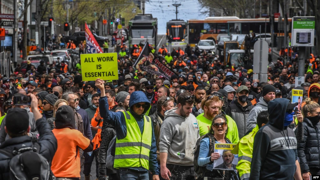 Construction workers and demonstrators