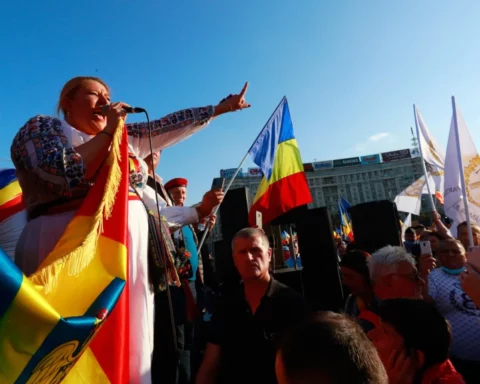 Diana Sosoaca leads a protest against