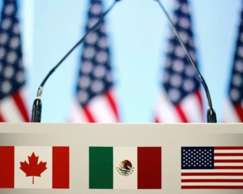 The flags of Canada, Mexico and the U.S. are