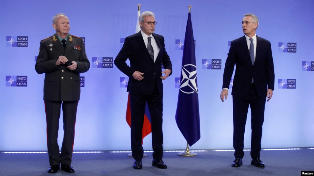 Aleksandr Fomin (left to right), Deputy Foreign Minister Aleksandr Grushko and NATO Secretary-General Jens Stoltenberg