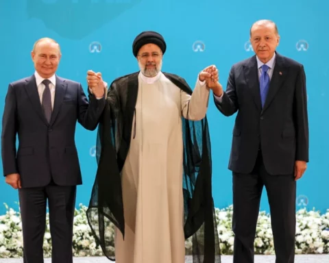 Vladimir Putin, left, Iranian President Ebrahim Raisi, center, and Turkish President Recep Tayyip Erdogan