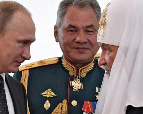 Patriarch Kirill , Russian President Vladimir Putin and Defense Minister Sergei Shoigu