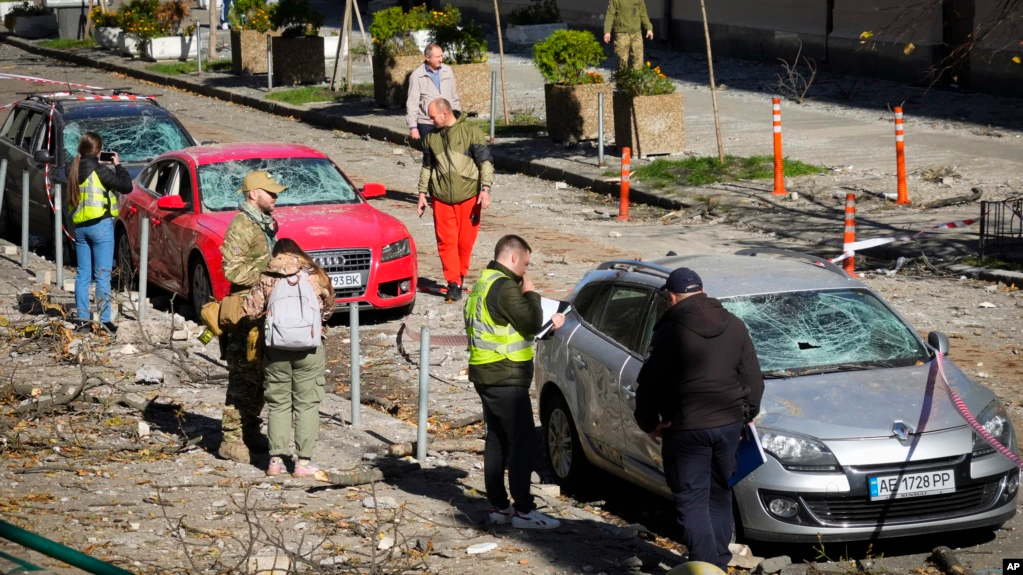 Police inspect and document the scene